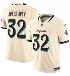 Men Jacksonville Jaguars 32 Jahlani Tavai Cream 2026 F U S E Rivalries Collection Limited Stitched Football Jersey Men Jacksonville Jaguars 32 Jahlani Tavai Cream 2026 F U S E Rivalries Collection Limited Stitched Football Jersey